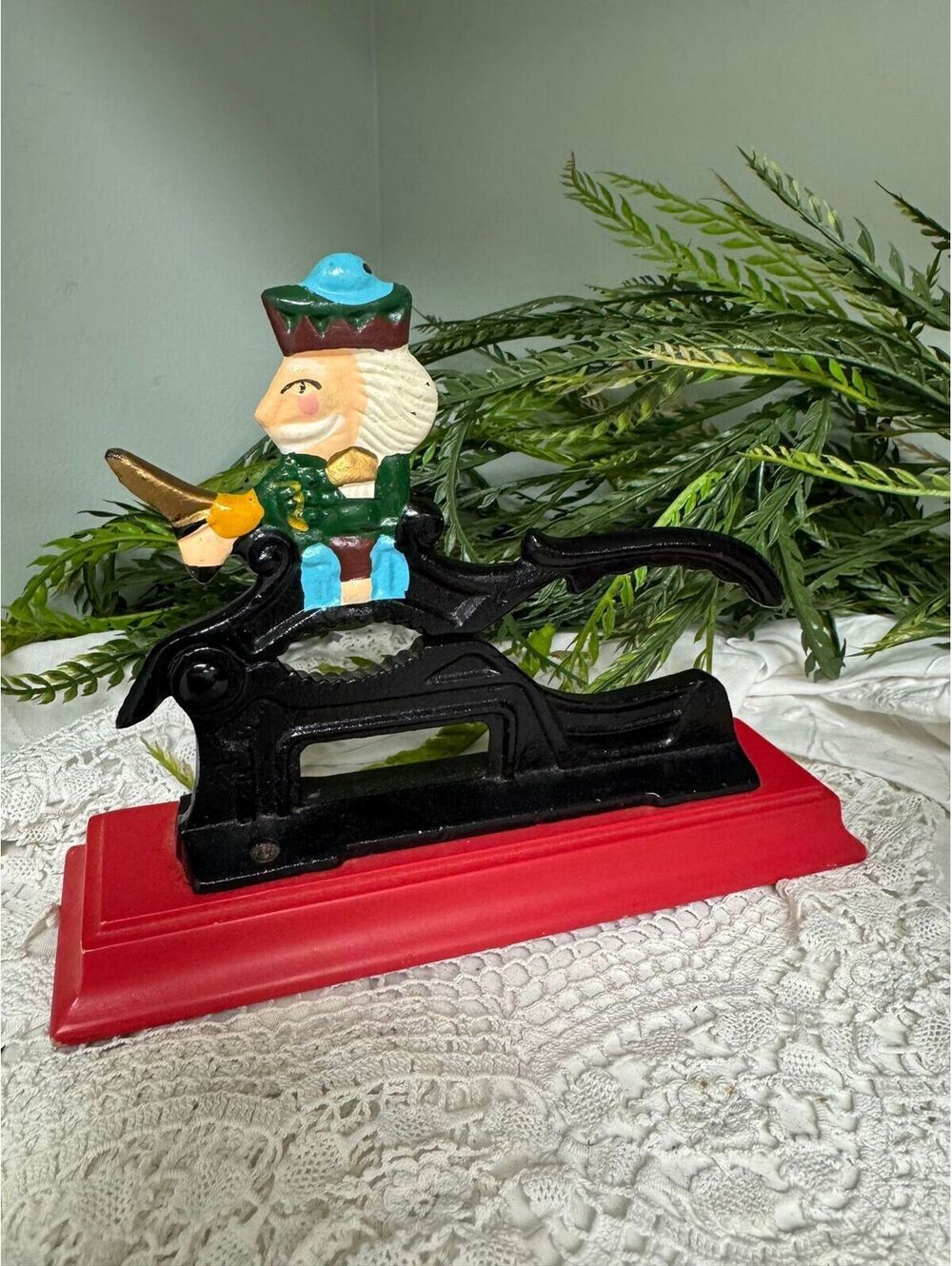 Vintage cast iron Christmas nut cracker